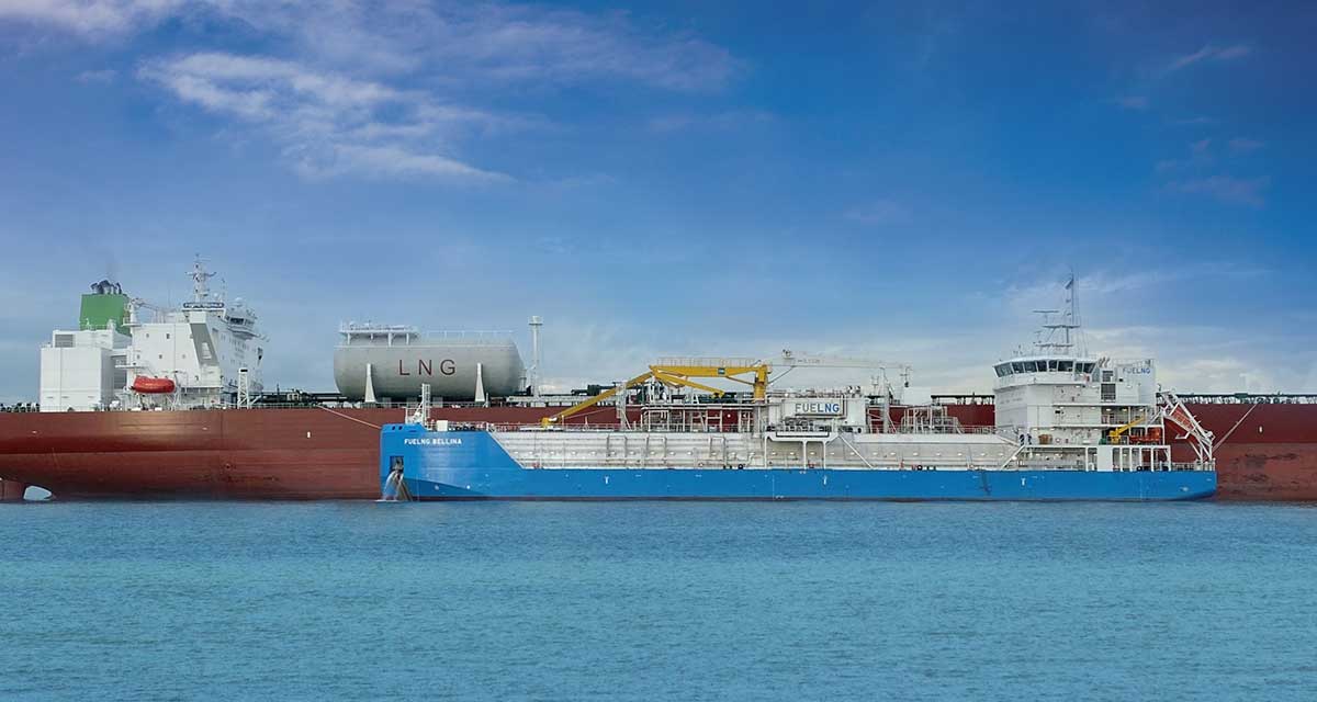 Oil tanker refueling via LNG vessel FUELNG BELLINA at sea
