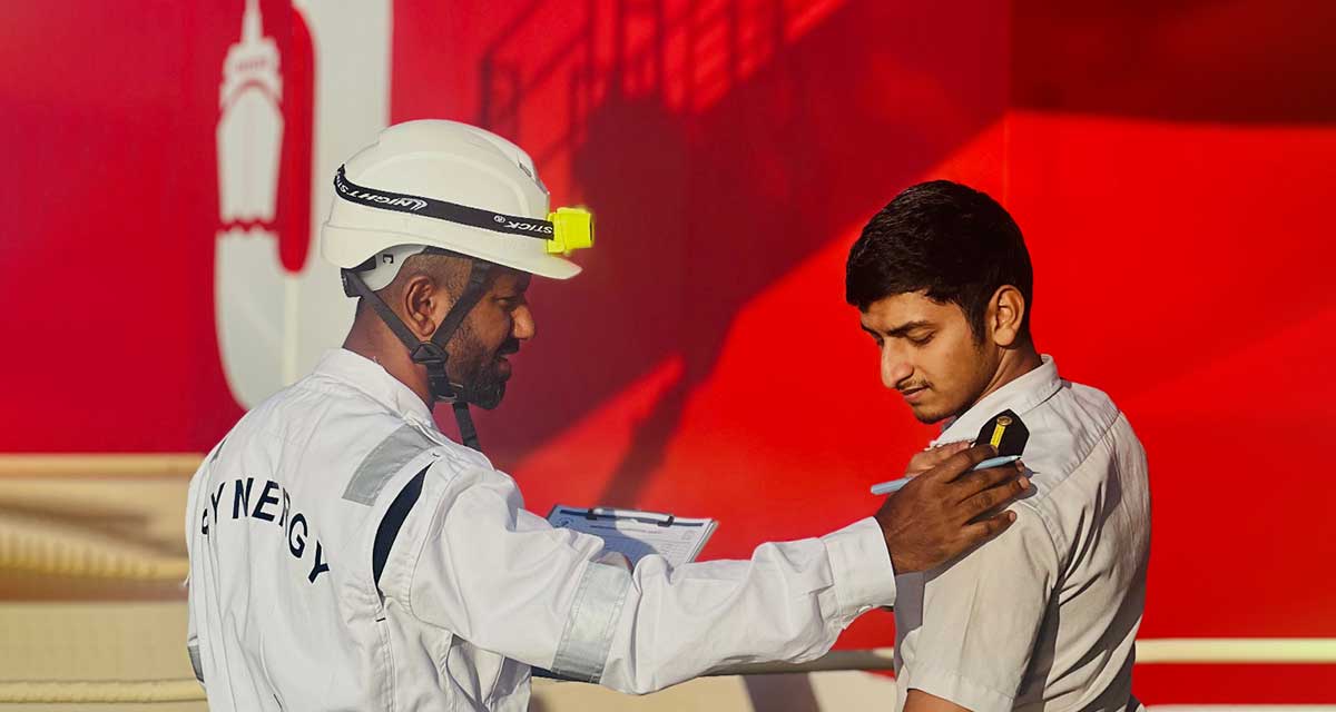 Chief Officer mentoring a Cadet aboard a vessel, demonstrating hands-on maritime training and leadership