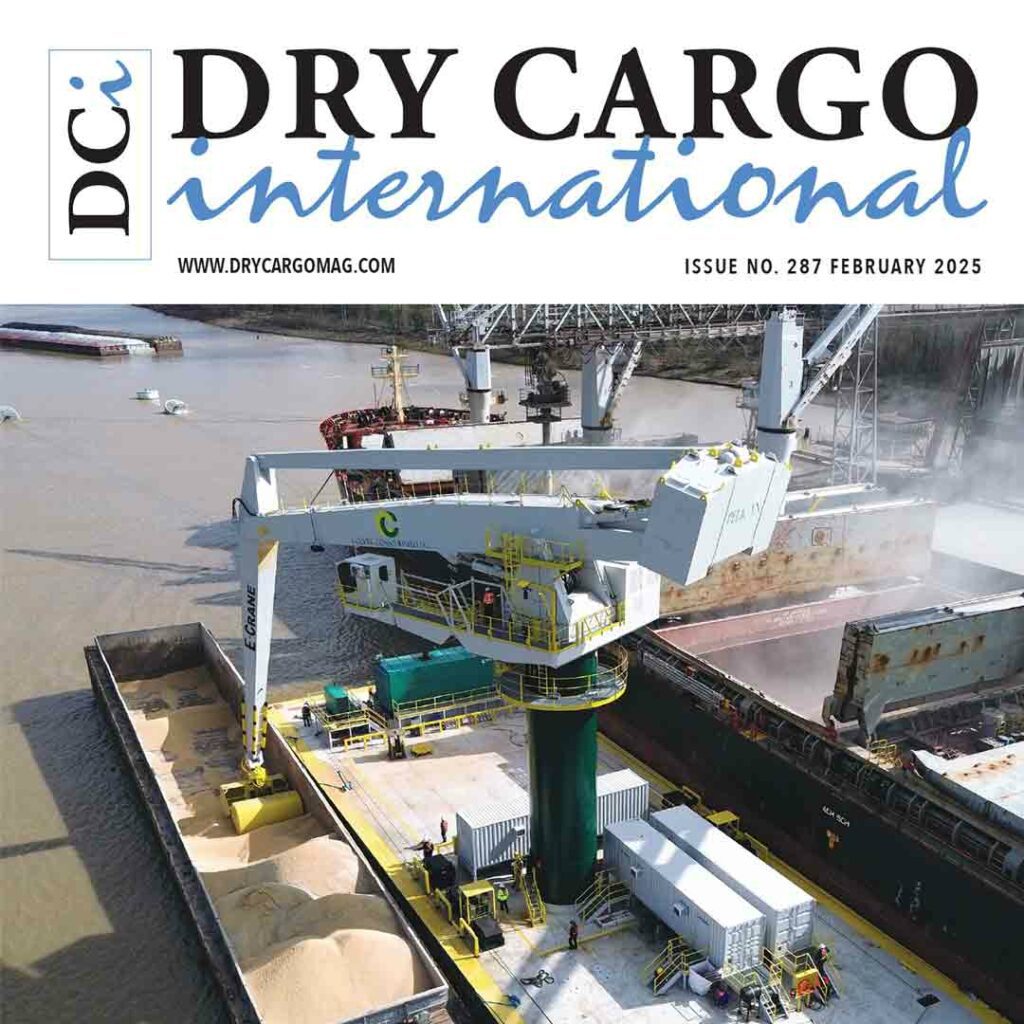 Dry bulk cargo loading operation at port featured on the cover of Dry Cargo International magazine