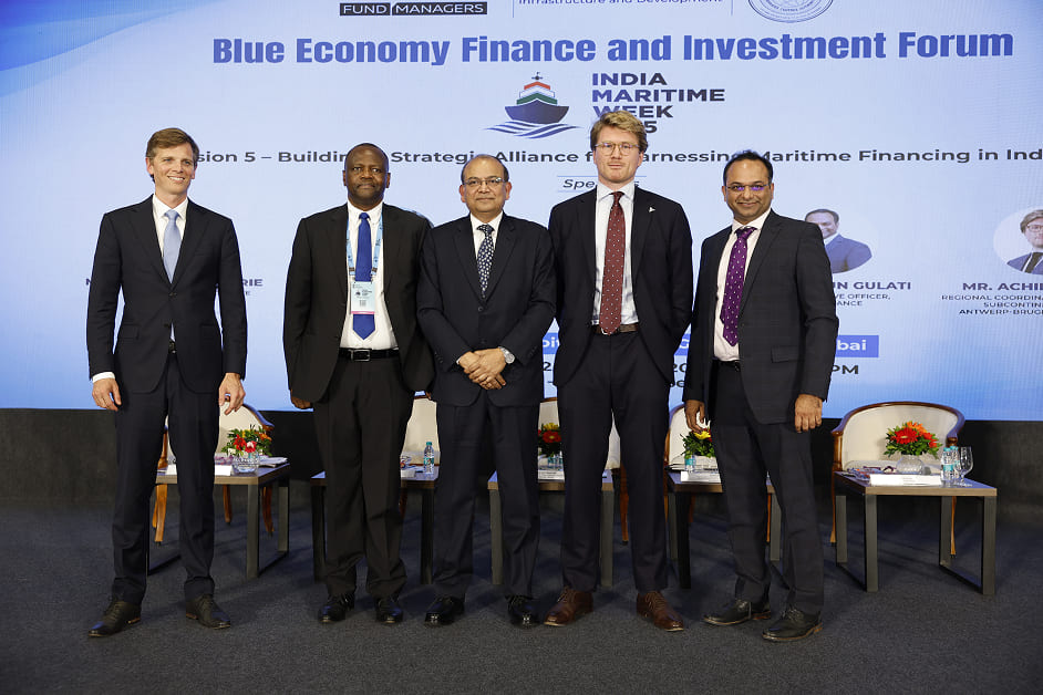 Speakers at the Blue Economy Finance & Investment Forum during India Maritime Week 2025 in Mumbai, including Ajay Chaudhry, Co-CEO – Ship Management, Synergy Marine Group, alongside global maritime and finance leaders.