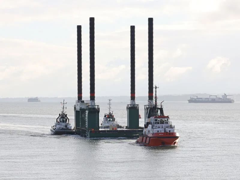Commercial and harbour tugs towing the BAE Systems vessel